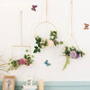 Iron and faux flower wall hanging decor
