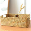 Rectangular straw basket styled in bathroom