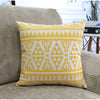 Geometric pillow cover styled on bed